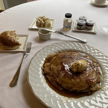 The Grill Room - Pair of Flapjacks: Cinnamon Toast with Vanilla cream and dark maple syrup.   Plain Bagel w/ dill cream cheese.   Sliced bananas. - New American Near Me - New Orleans, Louisiana