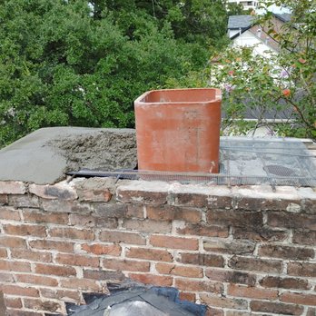 Dragon's Fireplace  - Repairing Mortar Crown with Rebar, Wire Mesh and Mortar. Added 18" Flue Tile. - Pressure Washers Near Me