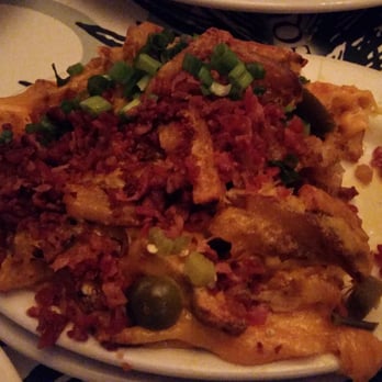 Brook Restaurant & Bar - Half eaten cheddar fries - American Near Me - Tulsa, Oklahoma Brook Restaurant & Bar - Half eaten cheddar fries - American Near Me - Tulsa, Oklahoma