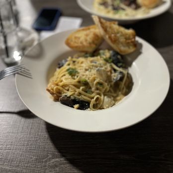 Challenger Tap House - a plate of spaghetti with mushrooms and broccoli - Sports Bars Near Me - Lancaster, California Challenger Tap House - a plate of spaghetti with mushrooms and broccoli - Sports Bars Near Me - Lancaster, California