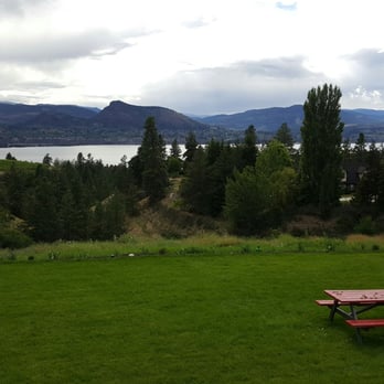 Legend Distilling - a picnic table in the middle of a field - Distilleries Near Me - Naramata, British Columbia