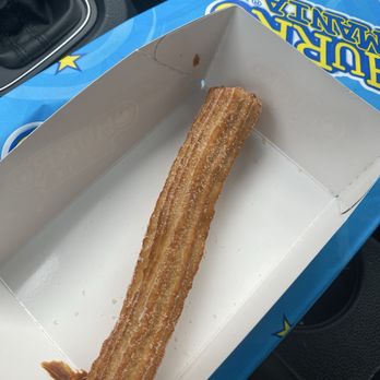 Churromania - Big Mania churro with DULCE DE LECHE filling and cinnamon sugar topping - Desserts Near Me - Dallas, Texas