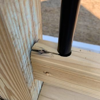 Top Notch Construction, Remodel & Design - a close up of a wood post - General Contractors Near Me - Dry Ridge, Kentucky Top Notch Construction, Remodel & Design - a close up of a wood post - General Contractors Near Me - Dry Ridge, Kentucky