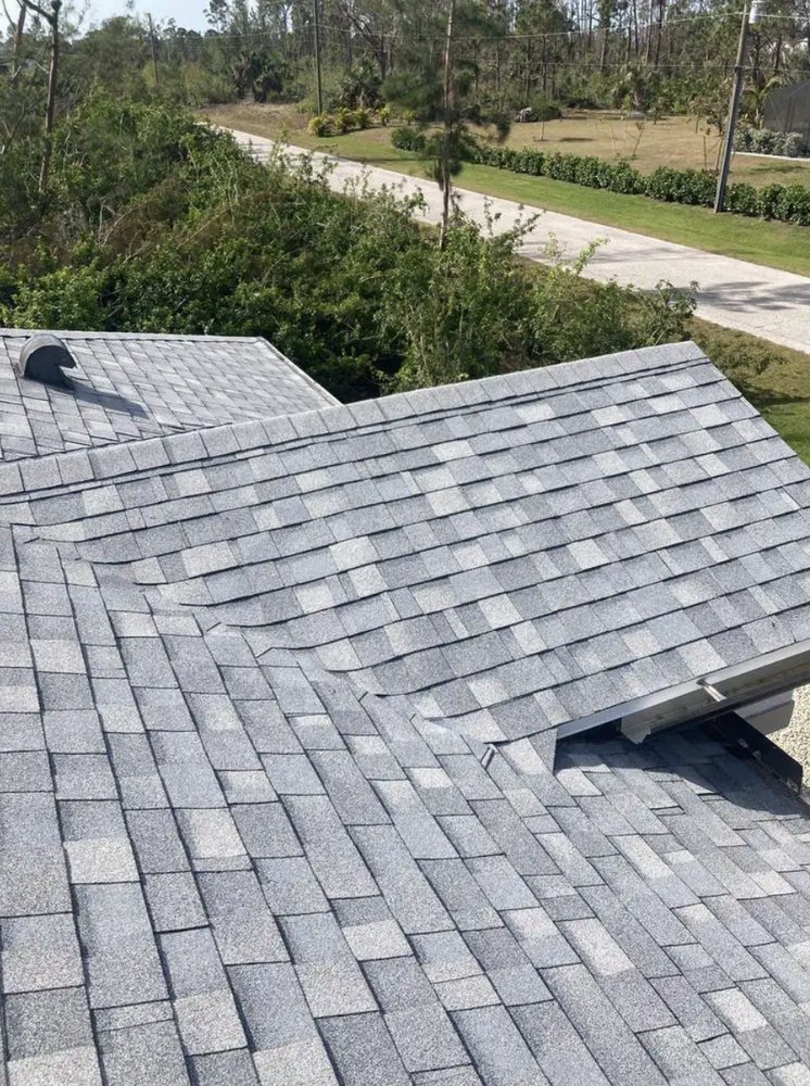 Slide of HP Storm Restoration - Roofing Company