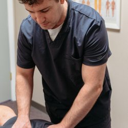 Plainfield Spine And Rehabilitation, Dr. McCarthy Chiropractor - Dr. Paul McCarthy adjusting a patient