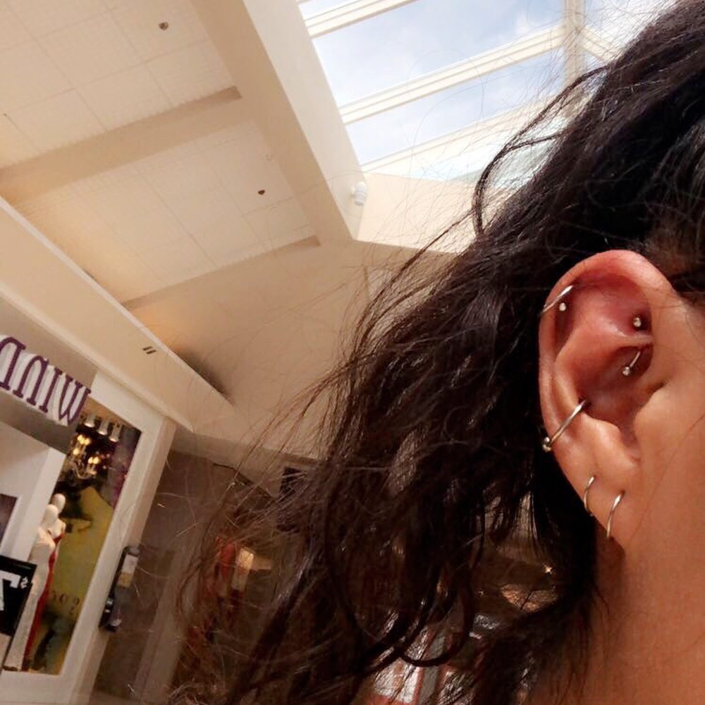 Double cartilage by Christina and my rook & conch by Felicia