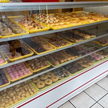 Sonny Donuts - a display case full of doughnuts - Donuts Near Me - Lewisville, Texas Sonny Donuts - a display case full of doughnuts - Donuts Near Me - Lewisville, Texas