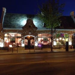 Root Consignment Company - Shot of store front at night