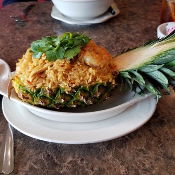Chiangmai Thai Kitchen - Pineapple fried rice - with chicken, shrimp, cashews, raisins, and pineapple. - Thai Near Me - Tyler, Texas Chiangmai Thai Kitchen - Pineapple fried rice - with chicken, shrimp, cashews, raisins, and pineapple. - Thai Near Me - Tyler, Texas