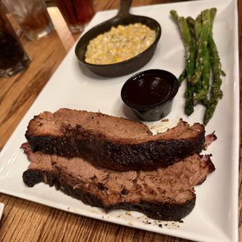 T Lawson’s Grill - Brisket plate with asparagus and creamed corn - Sports Bars Near Me - Grand Rivers, Kentucky