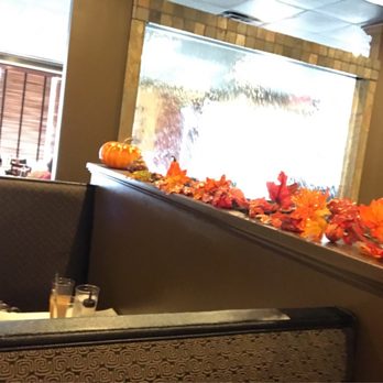Le Mekong - Table view of cool indoor waterfall glass. - Vietnamese Near Me - Johns Creek, Georgia