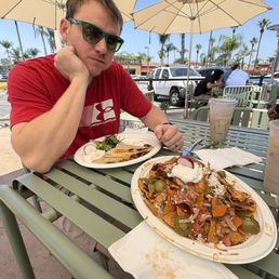 Nachos and a steak quesadilla with horchatas Nachos and a steak quesadilla with horchatas