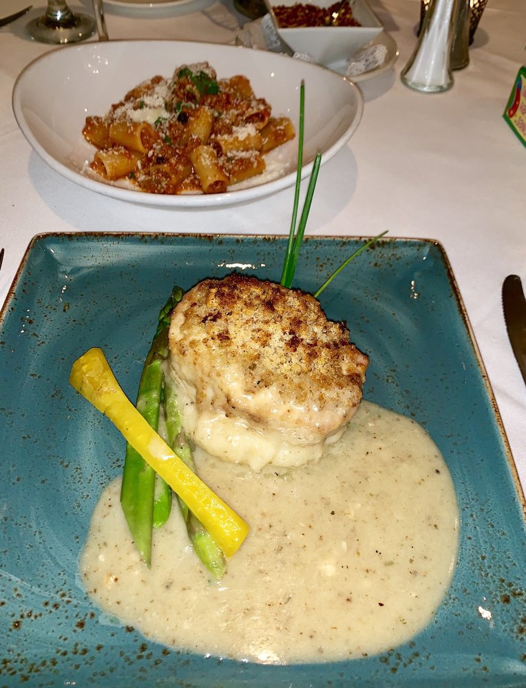 Order Swordfish Oreganato food online from Baci Restaurant store, San Diego on bringmethat.com