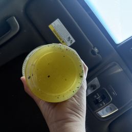 This is disgusting I asked for fresh orange juice with pineapples and look there's trash in my drink!
