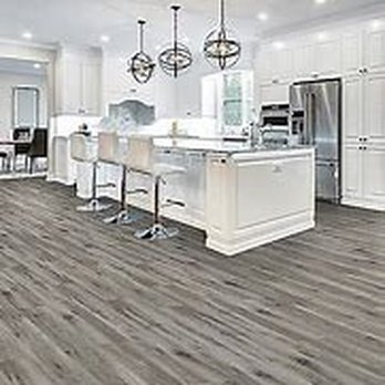 411 Service Provider - a kitchen with white cabinets and wood floors - General Contractors Near Me - Ontario, California 411 Service Provider - a kitchen with white cabinets and wood floors - General Contractors Near Me - Ontario, California