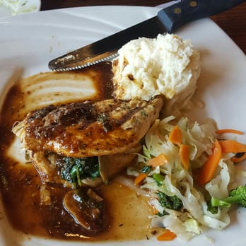 Mo Bay Grill - I started eating before I took the pic. Stuffed jerk chicken with the garlic mashed potatoes - Caribbean Near Me - Sebastian, Florida Mo Bay Grill - I started eating before I took the pic. Stuffed jerk chicken with the garlic mashed potatoes - Caribbean Near Me - Sebastian, Florida