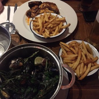 Belgo Soho - Pot of mussels and chips / rotisserie chicken (classic) with chips - Belgian Near Me - Soho, XGL