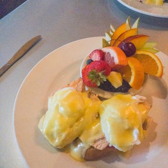 Cafe Sintra - Salmon Benedict with fruit. - New American Near Me - Sunriver, Oregon Cafe Sintra - Salmon Benedict with fruit. - New American Near Me - Sunriver, Oregon