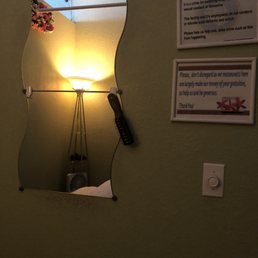 Massage room - mirror and some notices. I wouldn't use the brush tho. Massage room - mirror and some notices. I wouldn't use the brush tho.