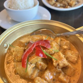Happy Thai - Yummy Panang Curry with tofu and in the background a large portion of drunken noodle also with Tofu. - Thai Near Me - Fairfax, Virginia Happy Thai - Yummy Panang Curry with tofu and in the background a large portion of drunken noodle also with Tofu. - Thai Near Me - Fairfax, Virginia