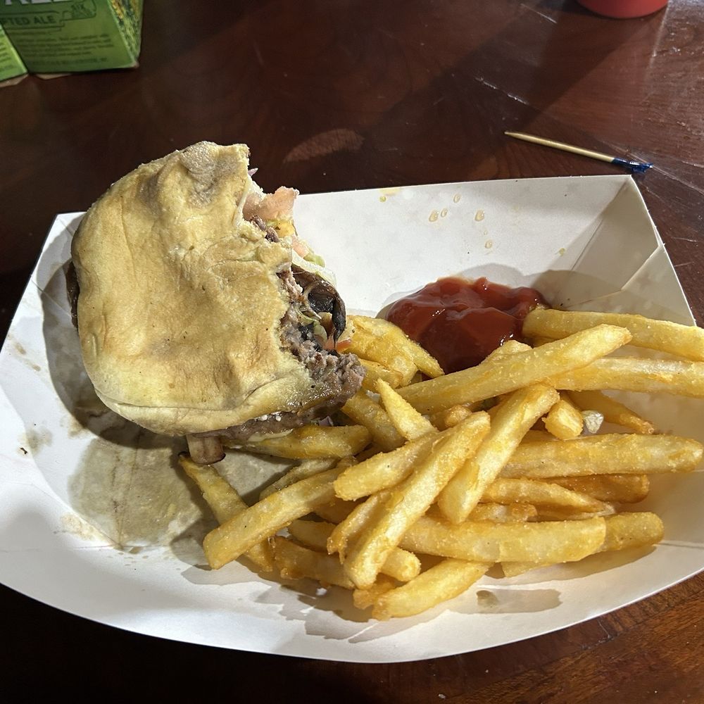 Mushroom Swiss burger with fries Mushroom Swiss burger with fries