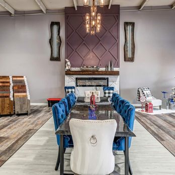 Elegant Flooring Showroom - a dining table with blue chairs - Flooring Near Me - Warner Robins, Georgia Elegant Flooring Showroom - a dining table with blue chairs - Flooring Near Me - Warner Robins, Georgia