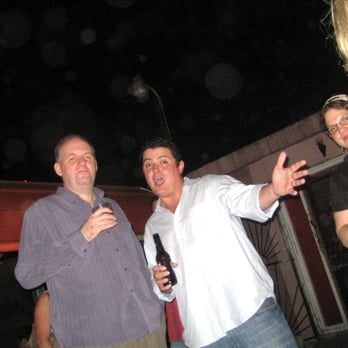 Big Star Bar - a man holding a beer and a woman standing next to him - Dive Bars Near Me - Houston, Texas Big Star Bar - a man holding a beer and a woman standing next to him - Dive Bars Near Me - Houston, Texas