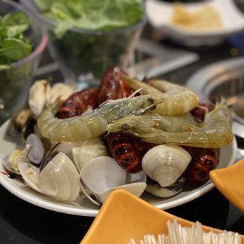 Boil Spot - Shrimp, crawfish, and clams about to be cooked inside the hotpot - Korean Near Me - Tampa, Florida