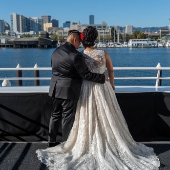 Luxe Cruises - Lesbian couple aboard the Merlot. Photo by Ben Afrang Photography. - Venues & Event Spaces Near Me - Alameda, California