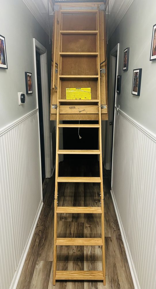 Slide of Turners Attic Solutions