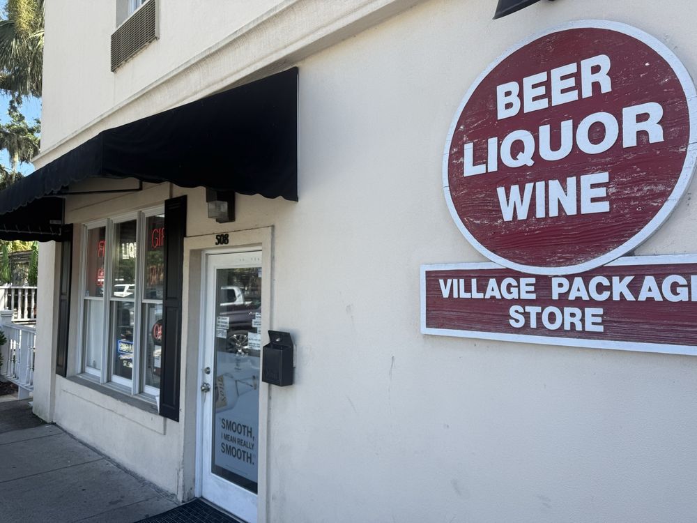 Village Package Store Logo