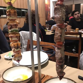 Carvoaria Jacto - Seafood skewer and steak and sausage skewer. Seafood comes with vegetables and both meats come with salad bar - Steakhouses Near Me - Lisbon, 11