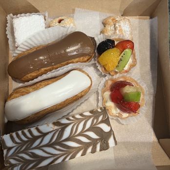 La Bonne Bouchee - Large Fruit Tart, vanilla eclair, chocolate eclair, chocolate Neapolitan - Bakeries Near Me - Saint Louis, Missouri La Bonne Bouchee - Large Fruit Tart, vanilla eclair, chocolate eclair, chocolate Neapolitan - Bakeries Near Me - Saint Louis, Missouri