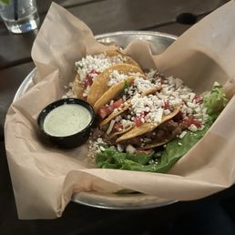 Street tacos. Order of four. Sauce was good. Street tacos. Order of four. Sauce was good.