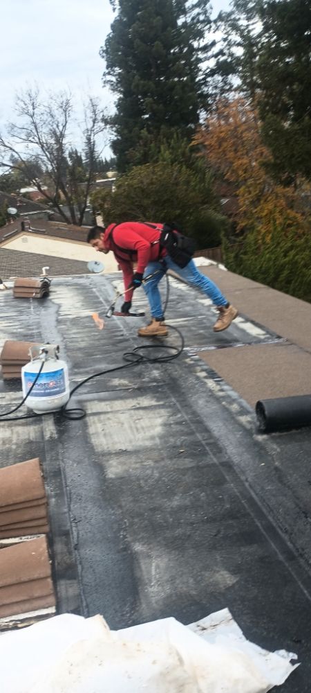 Slide of GT Roofing Services