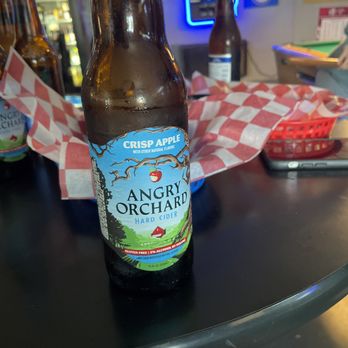 Stanley's Cup & Grill - a bottle of beer on a table - Chicken Wings Near Me - St. Louis, Missouri Stanley's Cup & Grill - a bottle of beer on a table - Chicken Wings Near Me - St. Louis, Missouri