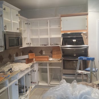 Kitchen Cabinets Repaint After Water Damage Insurance Claim Water Damage Insurance Claim