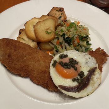 Bradleys Restaurant - Vienna Schnitzel "Holstein" style w/ Sauté Potatoes & Cabbage - British Near Me - London, XGL