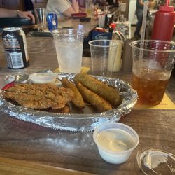 The Brown Jug Tavern - Catfish fillet and fried pickles.
