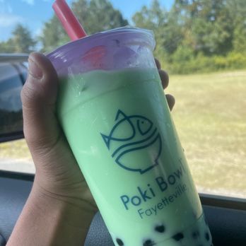 Poki Bowl - a hand holding a cup of bubble tea - Salad Near Me - Fayetteville, North Carolina Poki Bowl - a hand holding a cup of bubble tea - Salad Near Me - Fayetteville, North Carolina