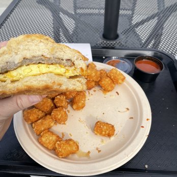 Butter Cafe & Bakery - Biscuit Sandwich with Tater Tots - Breakfast & Brunch Near Me - Upland, California Butter Cafe & Bakery - Biscuit Sandwich with Tater Tots - Breakfast & Brunch Near Me - Upland, California