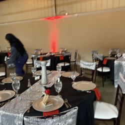 Moments Planning - Silver, red, and black tablescape setup for a corporate gala in Fayetteville, styled with precision and luxury finishes.