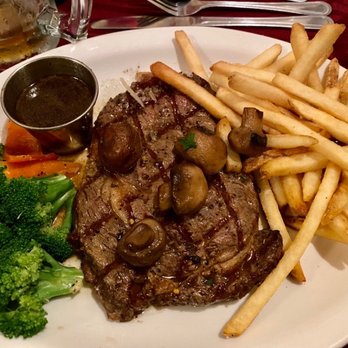 Charles Street Dinner House - Rib eye with mushrooms and fries. - New American Near Me - Mariposa, California