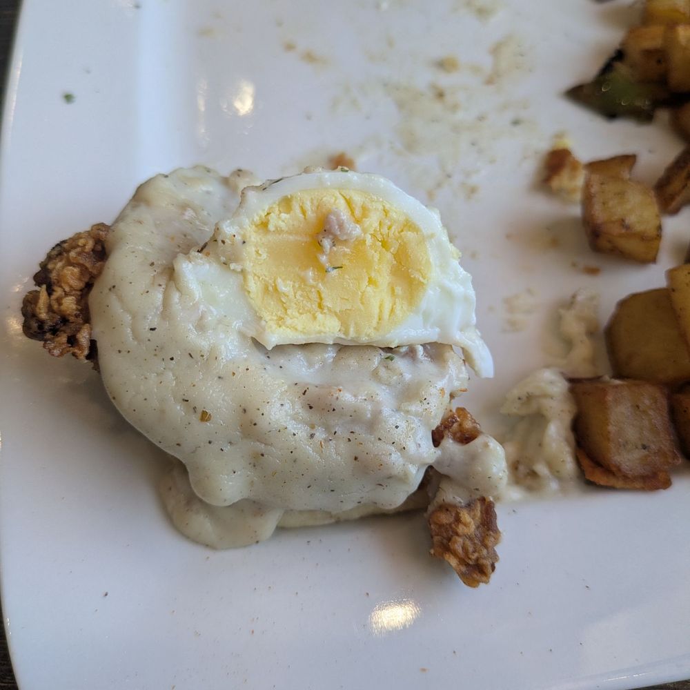 The Pan - Cross-section of overcooked poached egg in an eggs benedict dish - Breakfast & Brunch Near Me - Santa Ana, California The Pan - Cross-section of overcooked poached egg in an eggs benedict dish - Breakfast & Brunch Near Me - Santa Ana, California