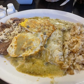 Mi Pueblito Cafe - Enchiladas Verdes Montadas de queso, with hash browns and refried beans. - Mexican Near Me - El Paso, Texas Mi Pueblito Cafe - Enchiladas Verdes Montadas de queso, with hash browns and refried beans. - Mexican Near Me - El Paso, Texas