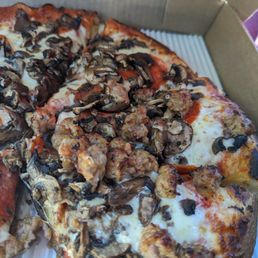 Pepperoni, mushroom and sausage on a thick crust Pepperoni, mushroom and sausage on a thick crust