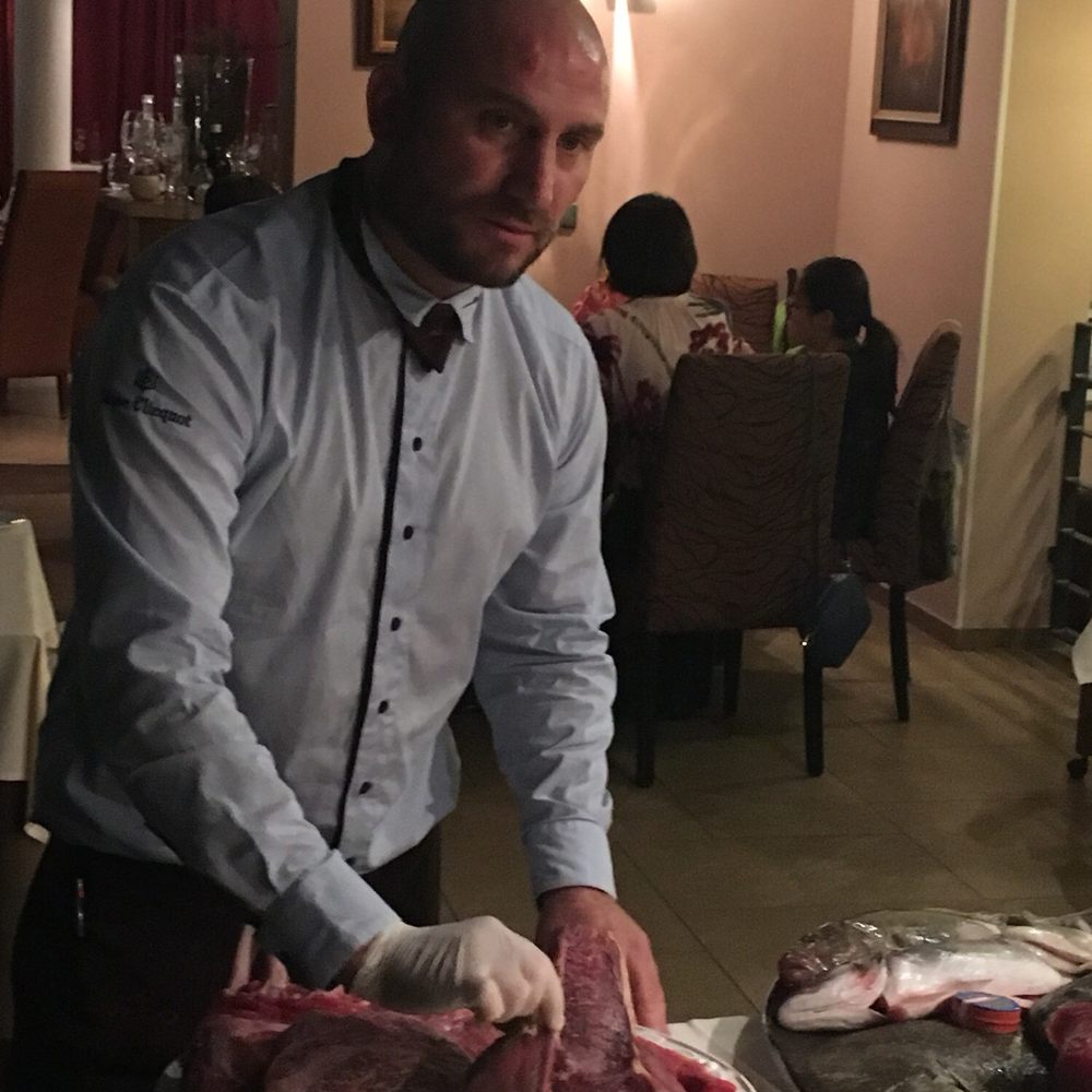 Borgo Agnese - Server explaining the cuts of beef. - Modern European Near Me - Brno, JM Borgo Agnese - Server explaining the cuts of beef. - Modern European Near Me - Brno, JM