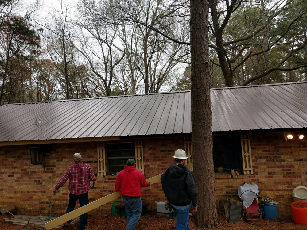 Slide of El Sol Roofing