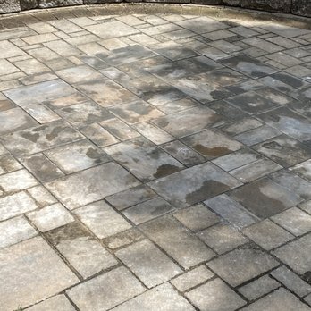 Lopez Landscaping Services - a brick patio with a stone wall - Landscaping Near Me Lopez Landscaping Services - a brick patio with a stone wall - Landscaping Near Me
