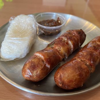 Banh Somtum - Lao sausage and sticky rice - Laotian Near Me - Houston, Texas